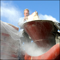Pouring in the cornstarch - that's a lot of dust