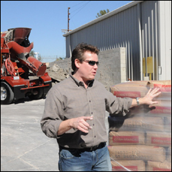 Steve Spangler in front of the stack of cornstarch bags at The Ellen DeGeneres Show